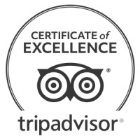 A TripAdvisor Certificate of Excellence badge with circular seal and the word “tripadvisor” beneath it.